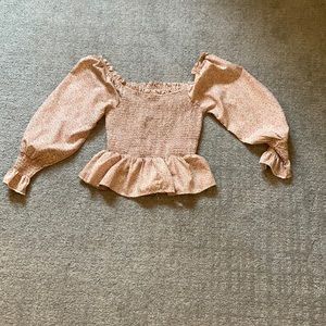 long sleeve flower top that’s tight around the chest
